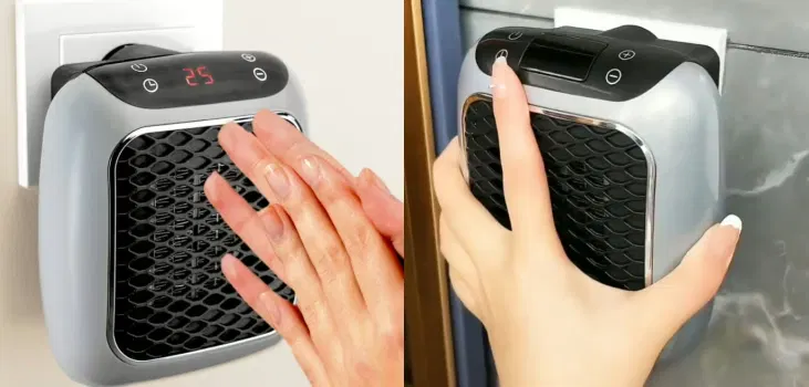 Hand pressing the power button on a heater plugged into a bedroom outlet.